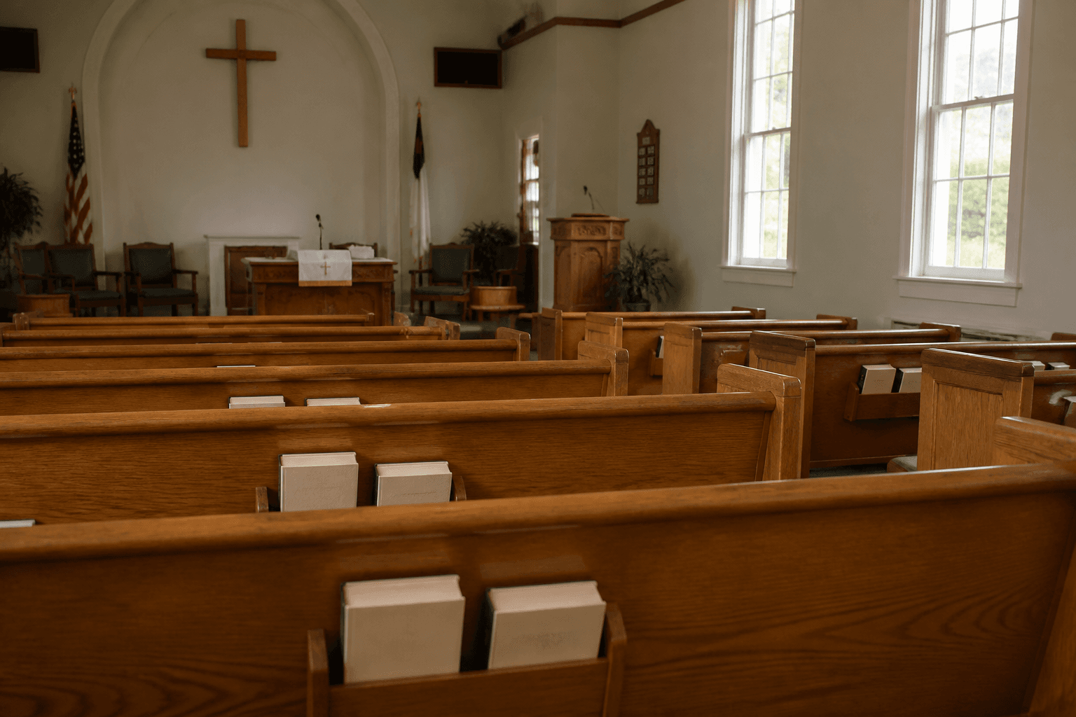 Empty pews in morning light before the first service